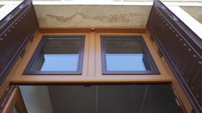 Double-vitrage de rénovation sur imposte de fenêtre